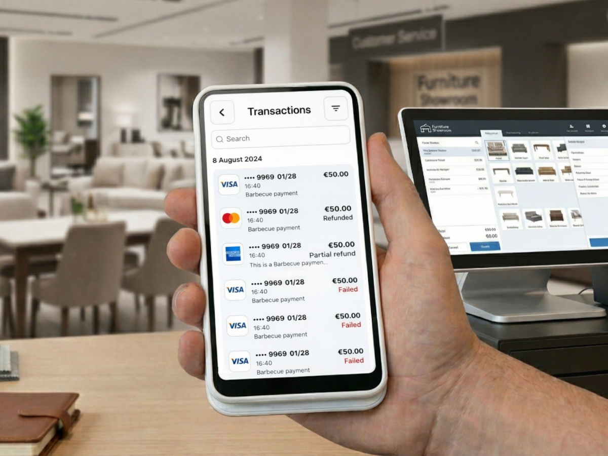 Hand holding a phone running our branded Stripe Terminal app in a furniture showroom